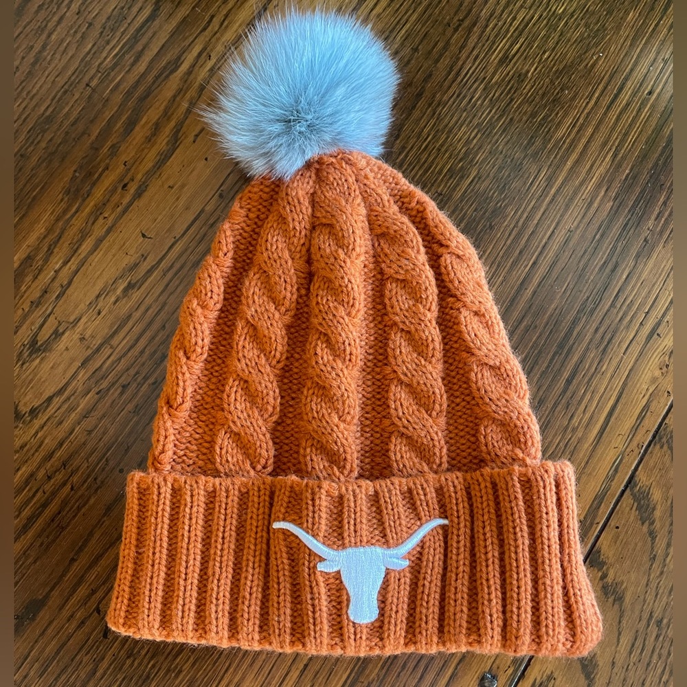 University of Texas longhorns winter cuffed pom hat. One size. Never worn.